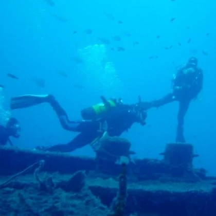 Diver exploring the BYMS 22 shipwreck off Saint-Raphaël