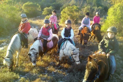 Pony ride - instructor holding the reins - Expérience Côte d'Azur