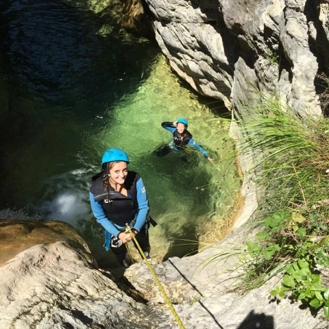 Jumping into a natural pool during a canyoning trip on the Côte d’Azur
